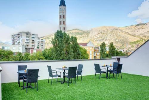 Villa Floris rooftop terrace with mountain view